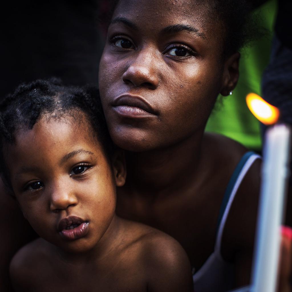 chris_granger's tweet photo. Bad week of news in New Orleans. I shot the candlelight vigil for #JasilasWright, friends/family gather to honor her http://t.co/ajxjs5InfW