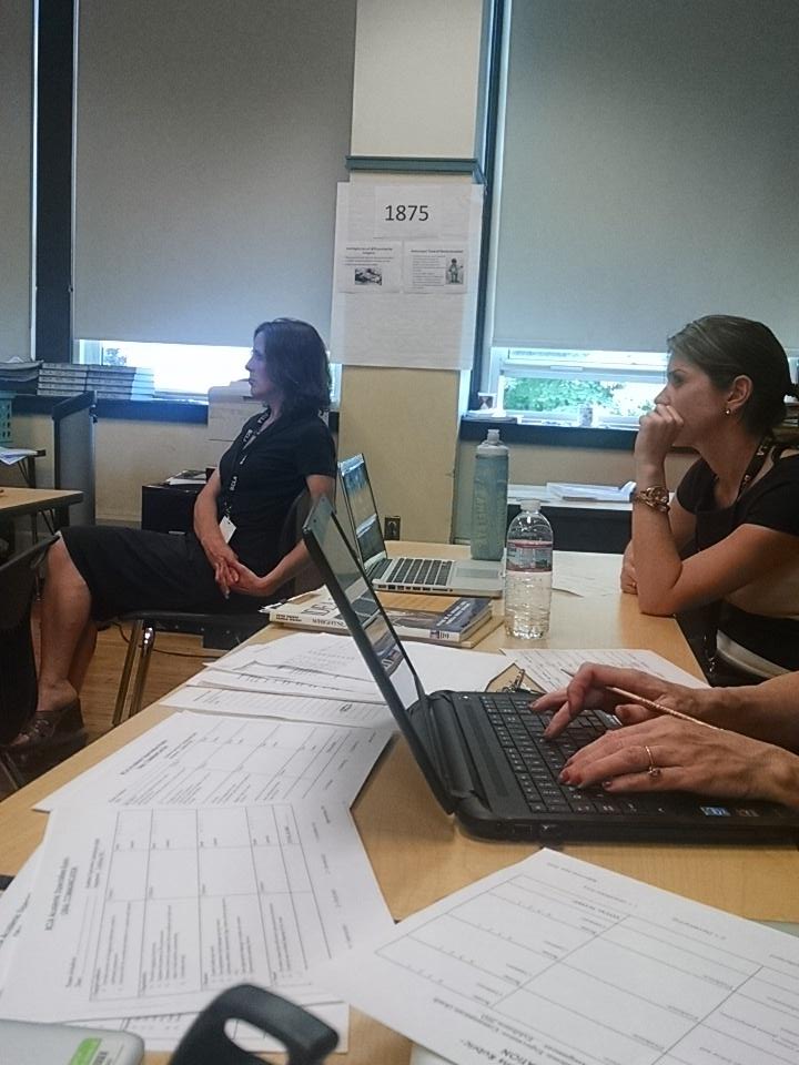 MsEvansBCLA's tweet photo. Principal Brett Dickens watches and teachers assess as Diego presents his World History #exhibition @BCLA_Boston http://t.co/VkfeOrvKjx