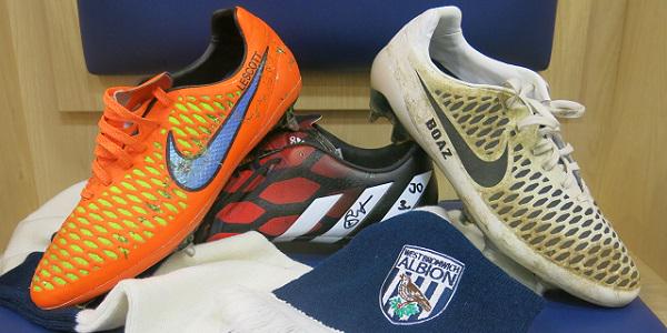 WBA's tweet photo. BUMPER BAGGIES BONANZA: Match-worn and signed boots up for grabs. To find out more, go to http://t.co/CZ5IBrutPq #wba http://t.co/Ll3lqrQgkQ