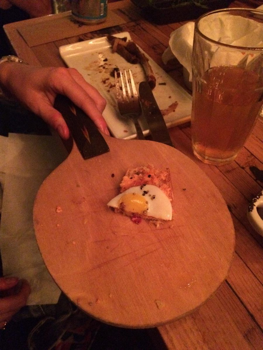 PoutineQueens's tweet image. Found something for @WeWantPlates - a very delicious quails egg and sweet pork sarnie...on a ping pong bat
