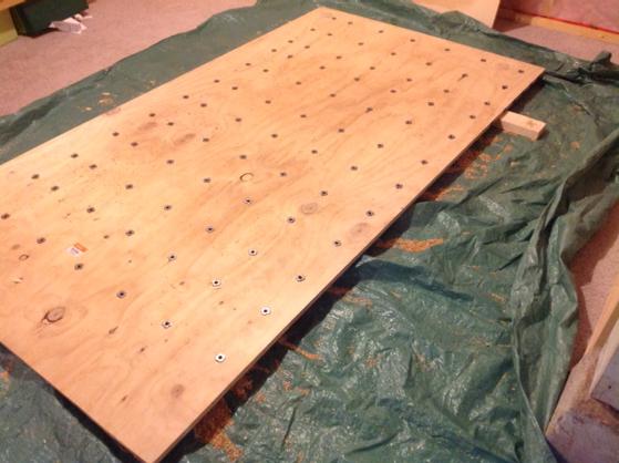 PaulrsimpsonR's tweet image. Wall 1 of 2, holes drilled and nuts mounted. Time to sweep up dust and rest. #boulderwall