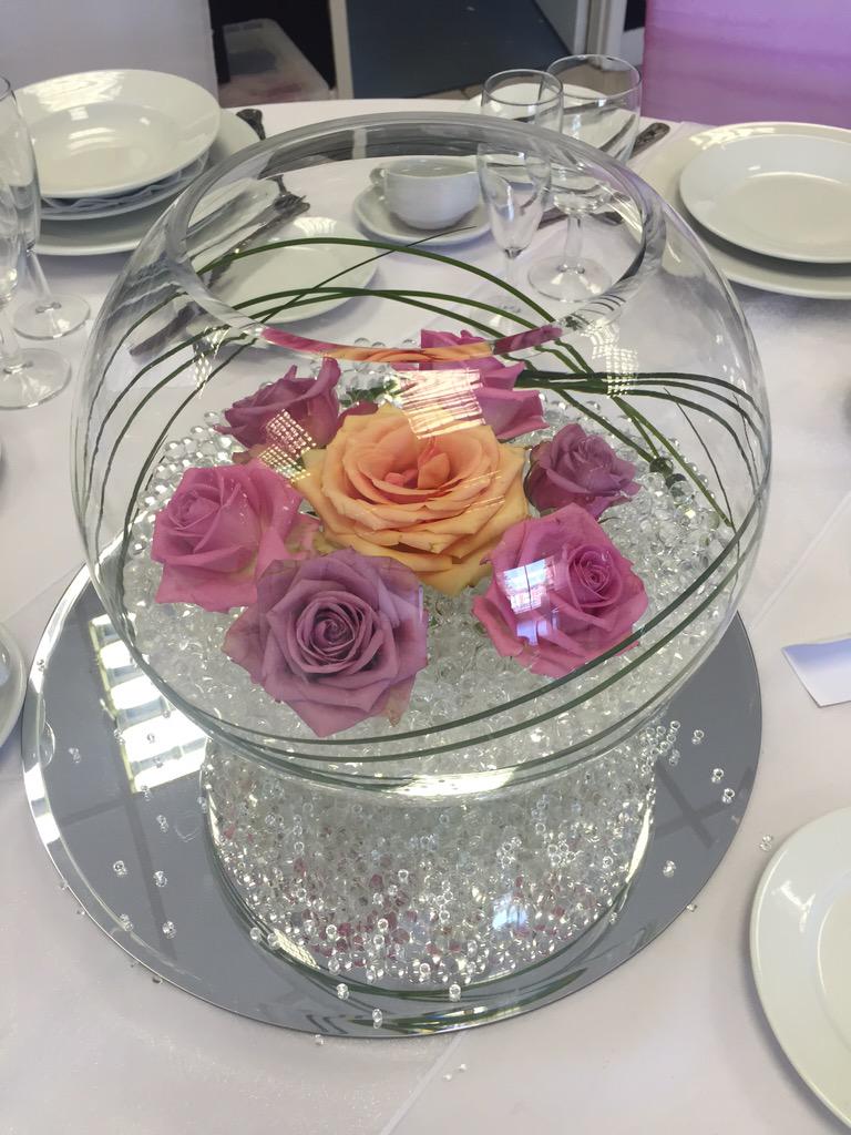 A simple elegant mock centrepiece for a future client! The roses are real!