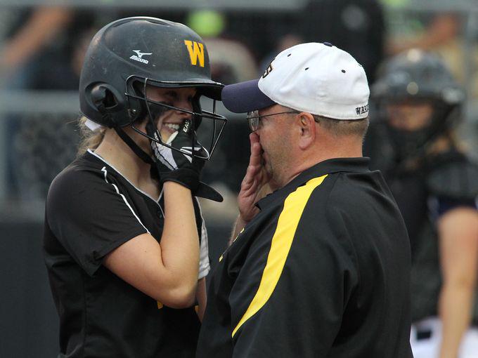 Finally took a look at state softball pics. My fav: Taylor Brown with the devious grin, knowing the squeeze is coming