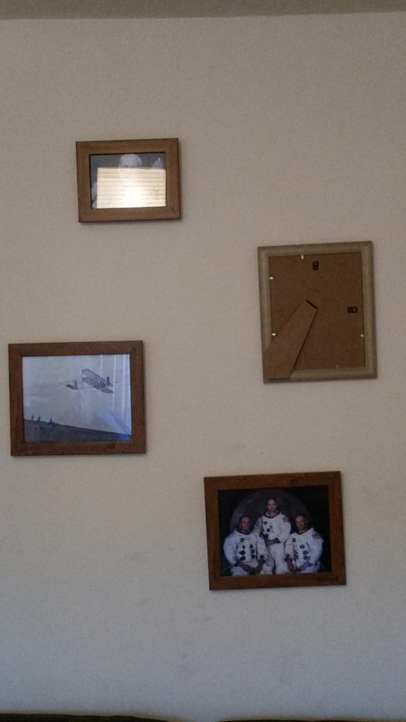 Miranda19c's tweet photo. You can really tell I work in exhibitions. Check out my living room wall ... #interiordesign #interiordesignfail http://t.co/ptYHqfhDbW