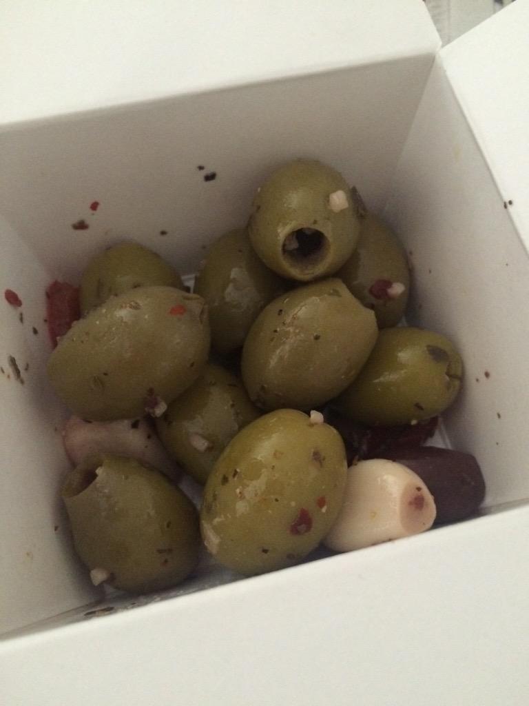 Natasha_Stacey's tweet photo. @NandosUK olives portion scrimping!! £3.40 for this measly amount. #notliketheolddays http://t.co/pXNnYUygWH