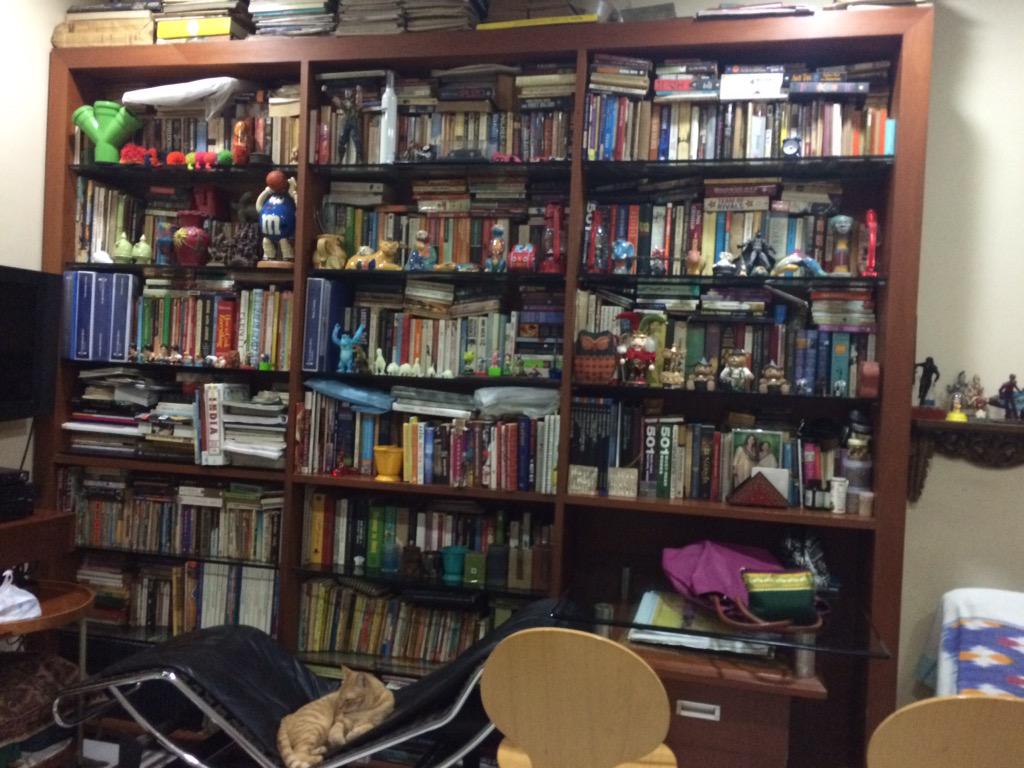 deepajbv's tweet photo. Went on Twitter after ages. Shubho here goes. #myhomelibrary lazy photo since I'm lazing and reading. http://t.co/gKTBr8LIT4
