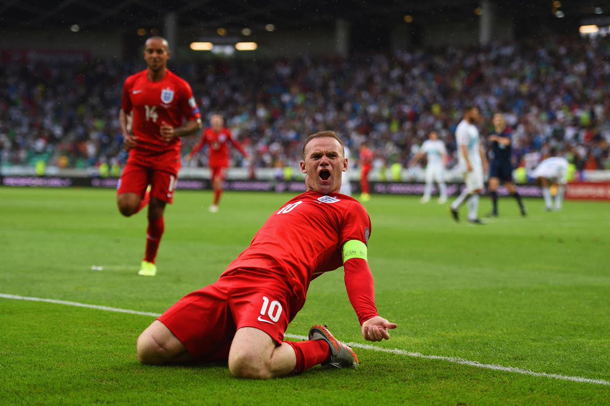 England's tweet photo. PHOTO: Cheers skip! England captain @WayneRooney celebrates his winner in Slovenia #SvnEng http://t.co/qHMp5Un431