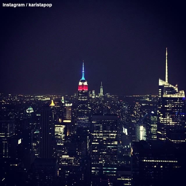 The Empire State Building in New York City is lit in red, white and ...