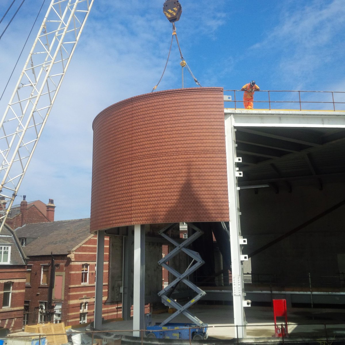 We're not on the webcam at the moment, but work continues @VGLeeds installing our radial panels #leeds #precast