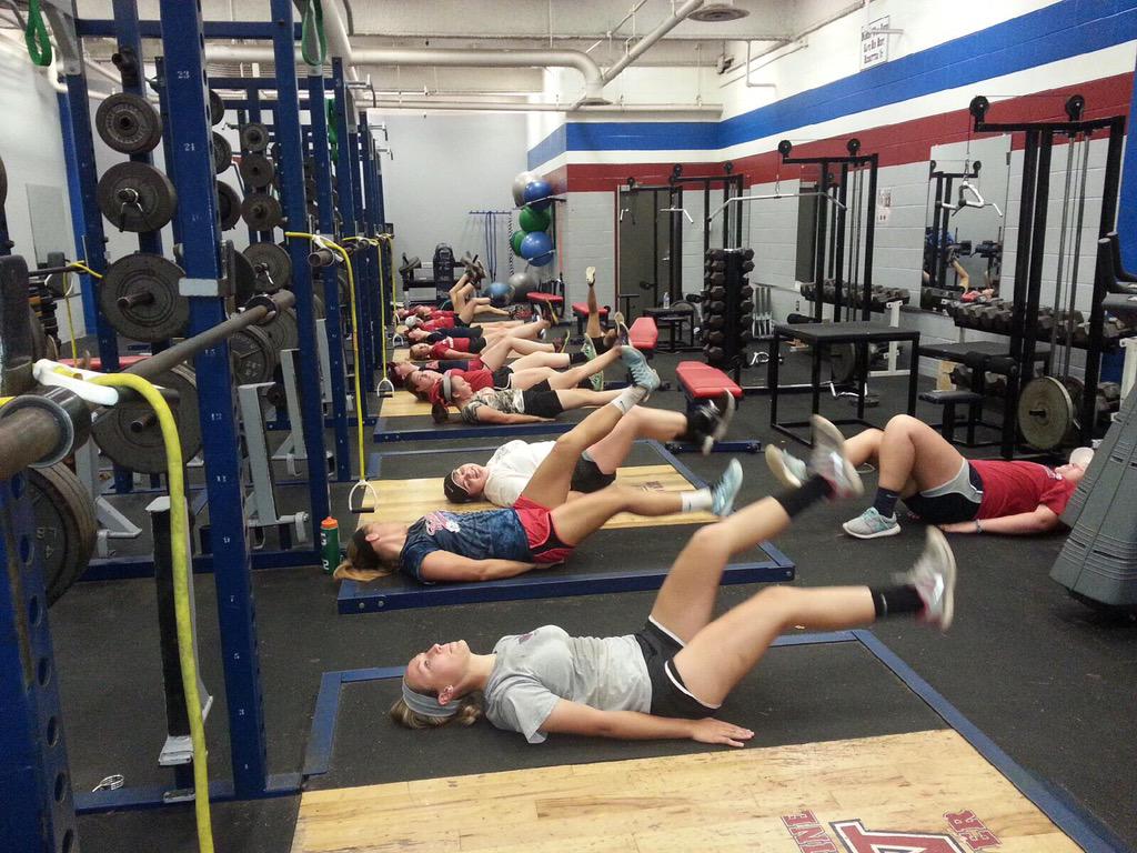 Woodstock softball at work in the weight room! #HardworkPaysOff