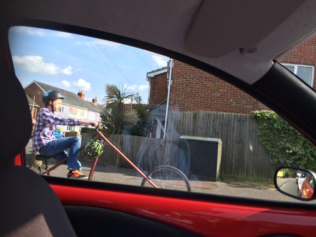 Burdett's tweet image. This kid. #Mental #twohelmets #doubleprotection