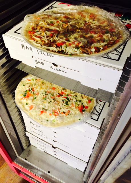 papamurphys's tweet photo. The pizza has been couried in & is ready to go! #SuperHotSummer #papamurphys http://t.co/Wvivalm6Rh