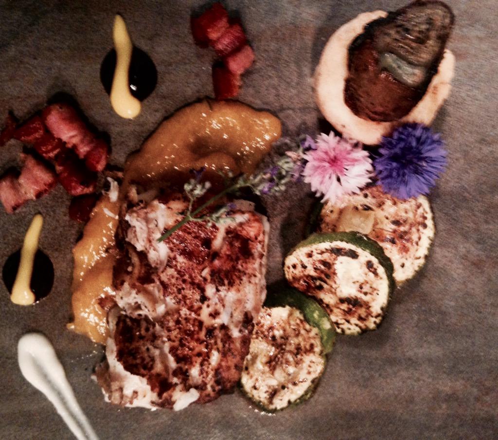 Seared cod fillet, potato croquette, charred zucchini, roasted shallot, bacon lardon, apricot lavender purée