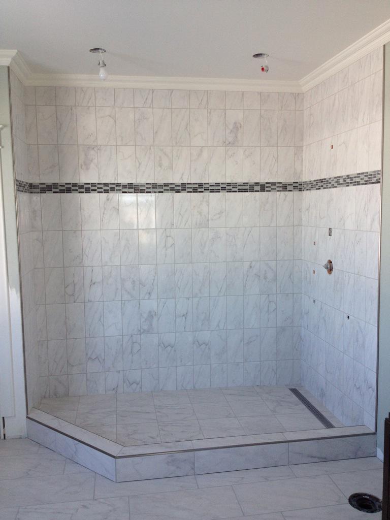 CustomTileWork's tweet photo. Sometimes keeping your #tiledshower #simple will work in your favour. #Tile #customtilework #renovation #shower http://t.co/YMyFZFhBZP