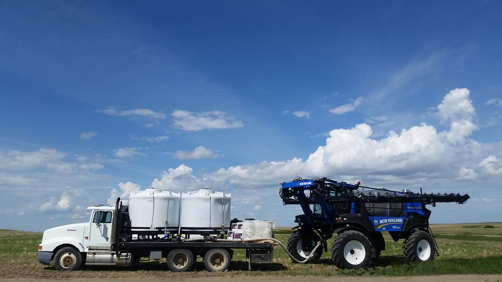 Filling er up to spray some flax #demo15 <a href="/EBourassaSons/">E. Bourassa & Sons</a> <a href="/NHAgriculture/">New Holland North America</a>