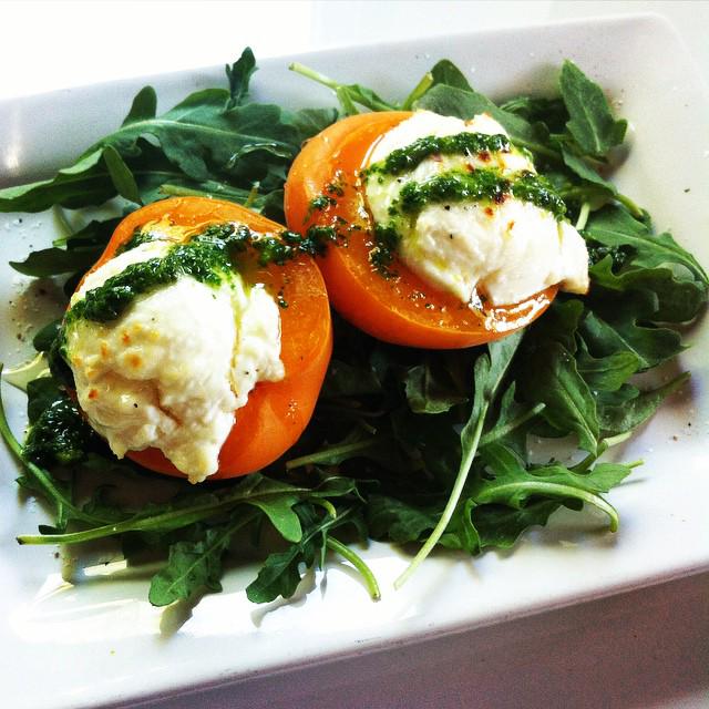 Roasted Apricots w/ an Arugula Pesto, Goat Cheese + Honey over a bed of #organic Arugula. #nom #slcdinner #smallplate