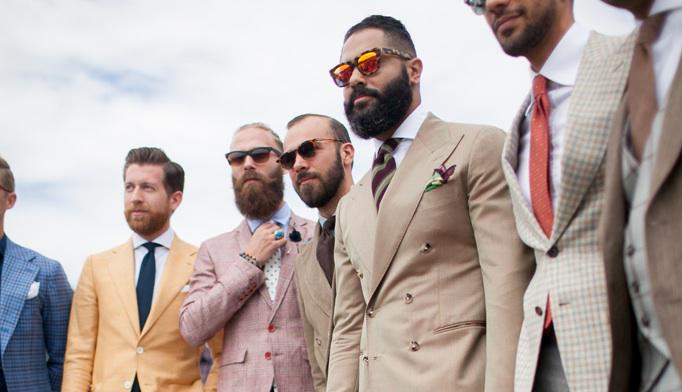 wwd's tweet image. A very fashionable group lined up at #PittiUomo. For more street style: wwd.com/fashion-news/t…