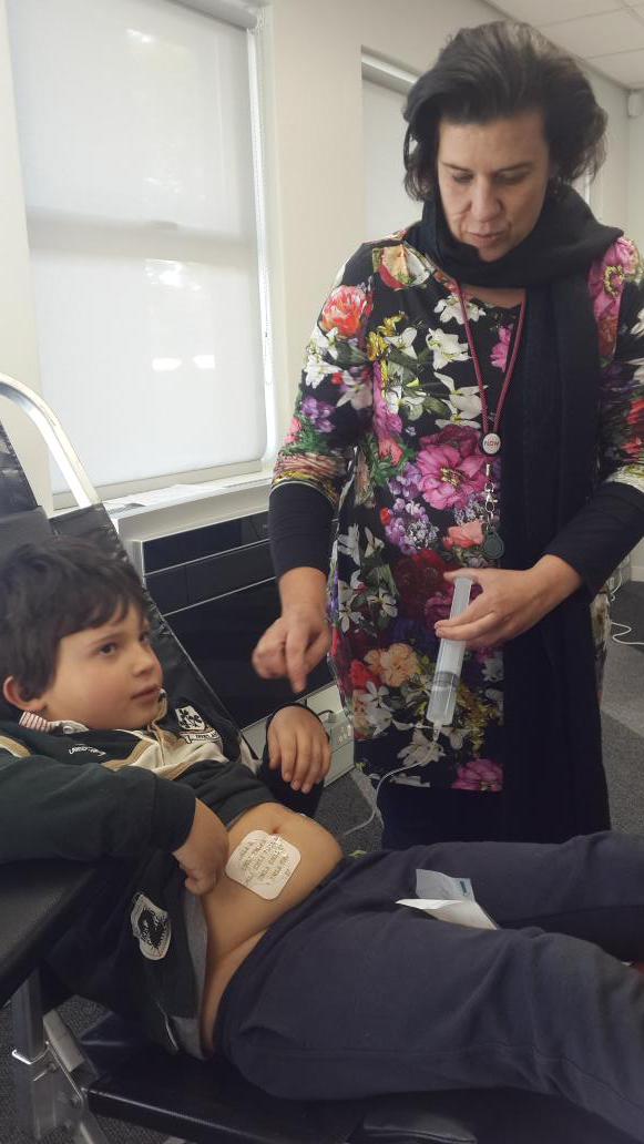 FlowComms's tweet photo. We've got @wooze66's son Rex to show us just how useful your blood is. You're a hero too Rex! #FlowBloodDrive http://t.co/HqM3g0bYgo