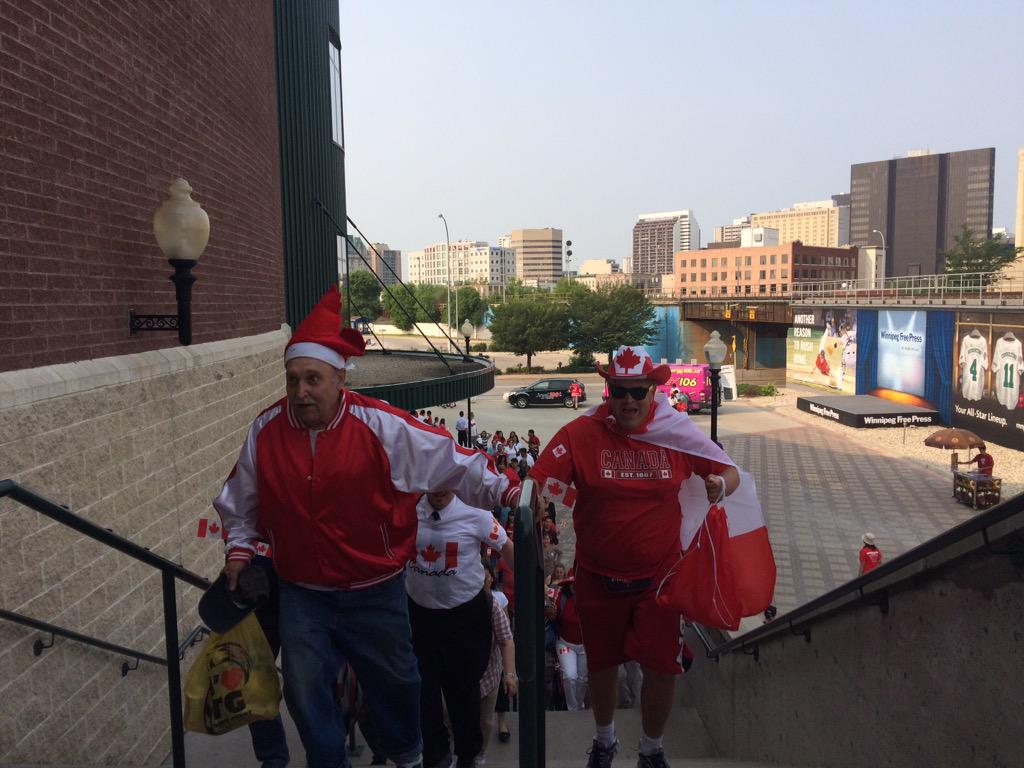 DowntownWpgBIZ's tweet photo. Here they come!!! (Yes, that's our man, Dancing Gabe!) #StrongProudFree #finditdowntown #cdlfwpg http://t.co/iT6M3hfbtR
