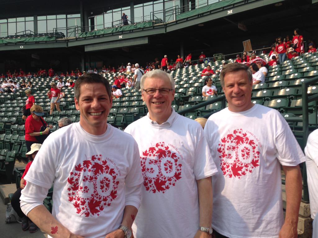 DowntownWpgBIZ's tweet photo. Thanks to @Mayor_Bowman @GregSelinger @lawrencetoetMP for kicking off our 5th annual Canada Day #livingflag http://t.co/kCxLAaMb5g