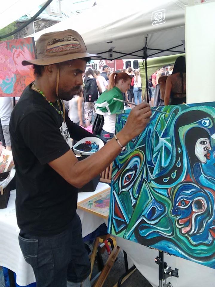 ArtsCan_Calgary's tweet photo. Artscan artist still at Canada Day! http://t.co/oXw3rnD11S