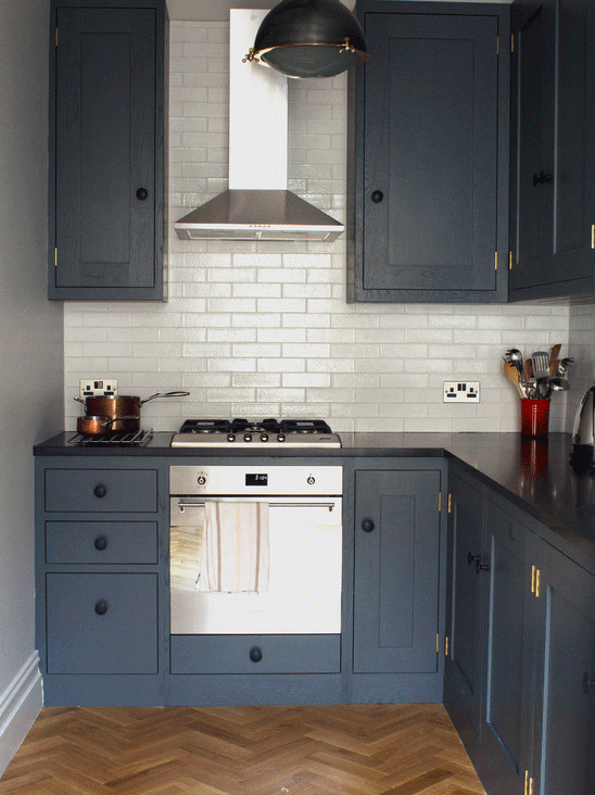 AnyKitchenltd's tweet photo. Small &amp; beautiful, this dark blue #kitchen utilises white metro tiles to give the effect of a wider space. #granite http://t.co/DdGyrzAHgK