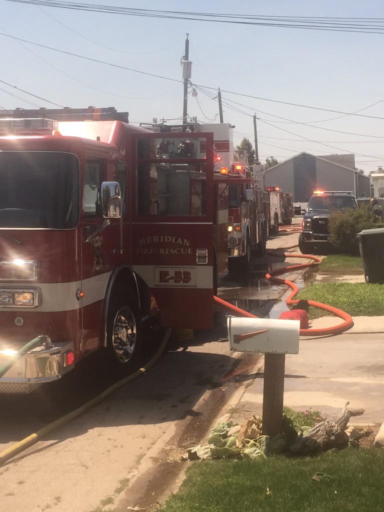MeridianFDChief's tweet photo. Crews put a quick stop on a fully involved trailer fire. Kept it from spreading. 100 degrees outside- hot in gear. http://t.co/HYjVgaWGRi