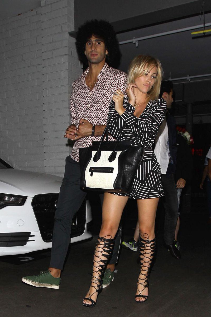 utdreport's tweet photo. Photos: Marouane Fellaini on holiday in Hollywood #mulive [men]: http://t.co/knzHEZ6rv5