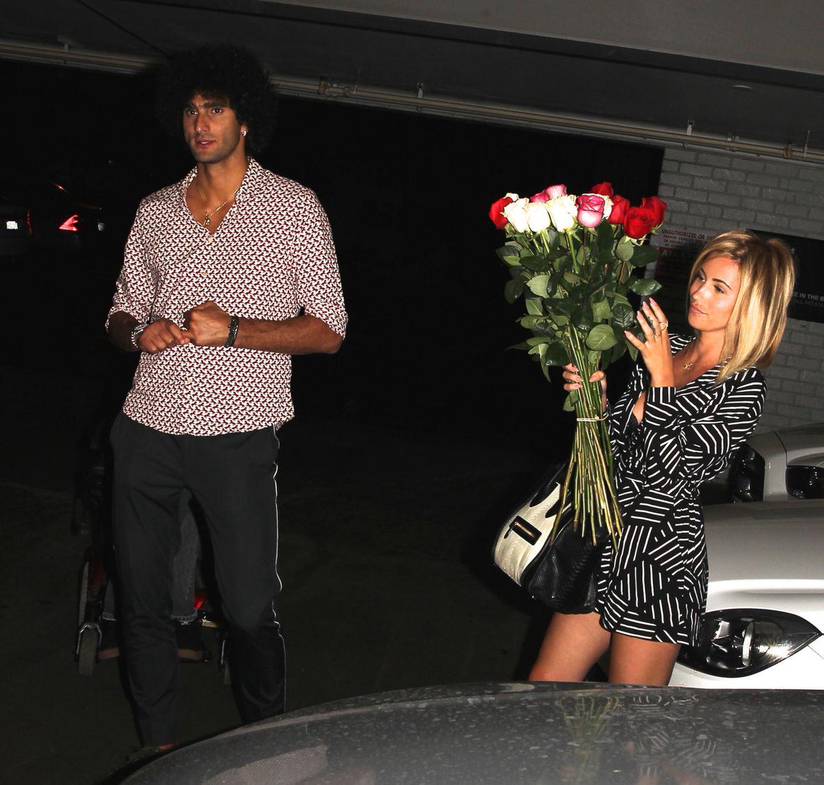 utdreport's tweet photo. Photos: Marouane Fellaini on holiday in Hollywood #mulive [men]: http://t.co/knzHEZ6rv5