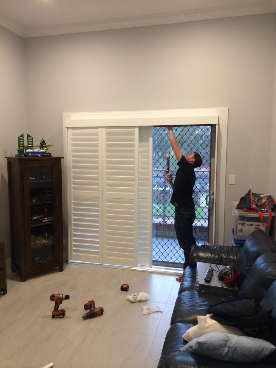 Our hardworking installation experts Ryan - sliding plantation shutters looking great! #interiordesign #shutters