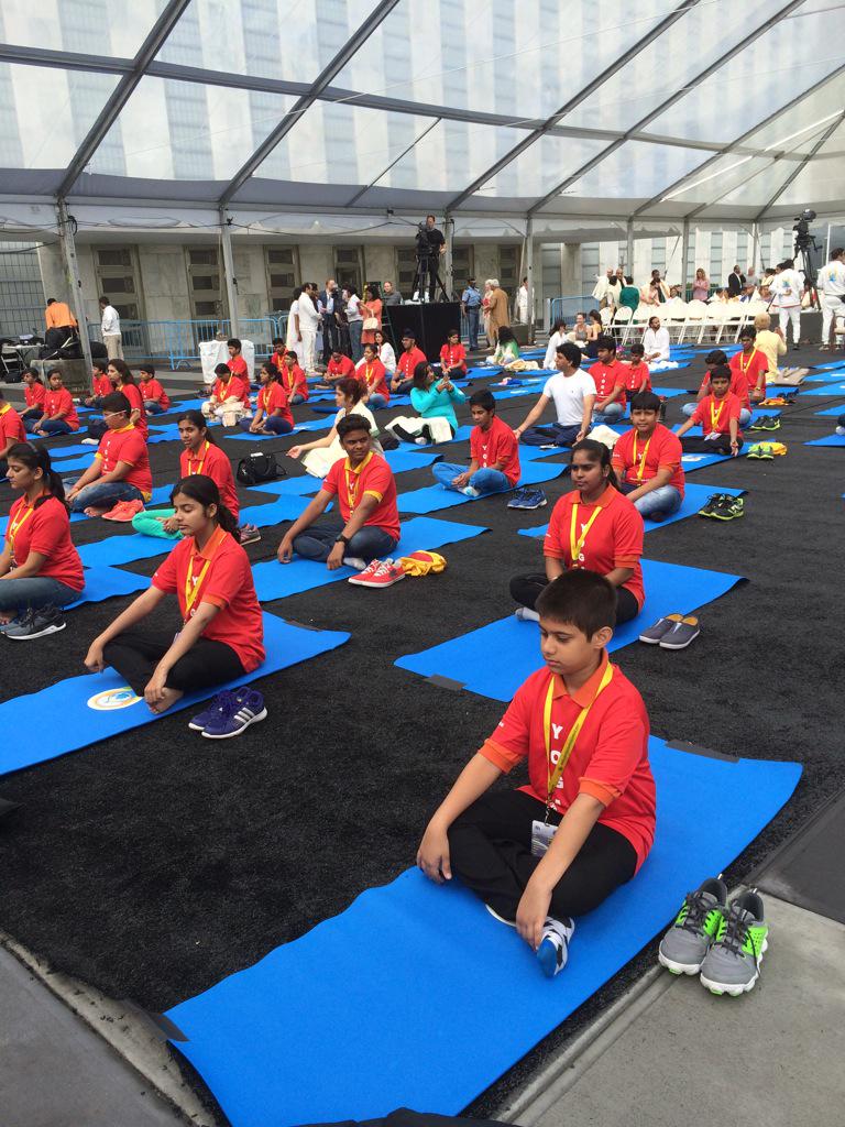 UN's tweet image. Mats are ready! #YogaDay at UNHQ in NYC will be underway soon! Watch live: webtv.un.org
