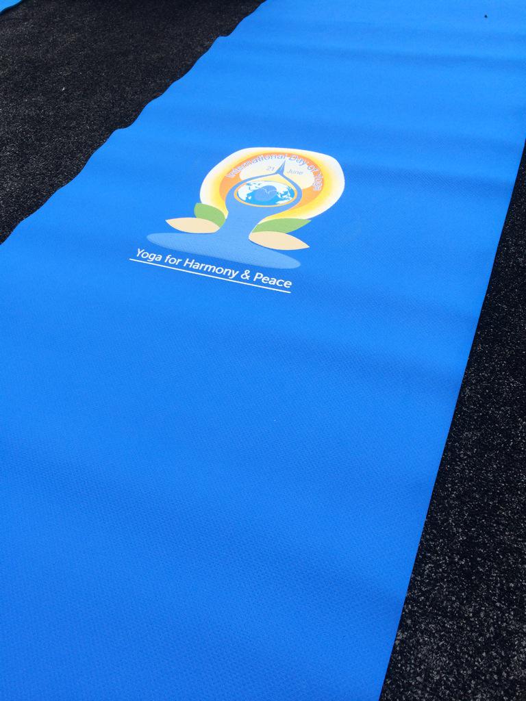 UN's tweet image. Mats are ready! #YogaDay at UNHQ in NYC will be underway soon! Watch live: webtv.un.org