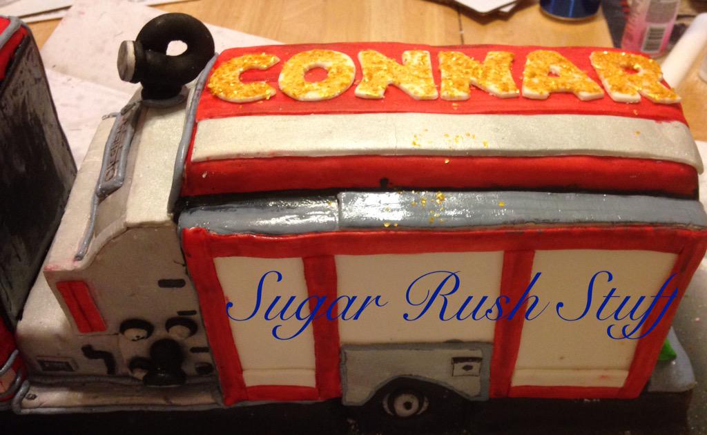 SugarRushStuff's tweet photo. #firetruck #firetruckcake #graduationcake #cake #rockcreekfirehall #firefightercake #fondant http://t.co/feqqfj65hy