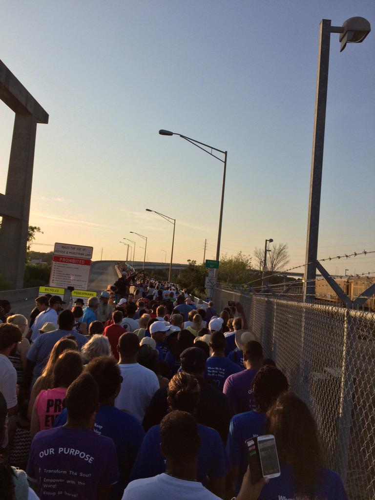 postandcourier's tweet photo. A sea of faces as far as the eye can see on the #RavenelBridge tonight. #UnityChainCharleston #BridgetoPeace http://t.co/OFTcEDR5Fh