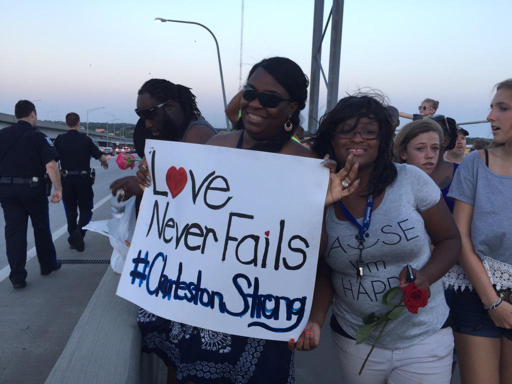 DDpan's tweet image. &quot;Love never fails.&quot; &quot;Be devoted to one another on brotherly love.&quot; #bridgetopeace #CharlestonUnityChain