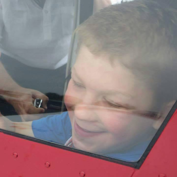 AWBCharity's tweet photo. Great picture from National Fly Kids Day #NFKD event. Big thanks to @BookerAviation #Smile says it all! http://t.co/fR1foKVIks
