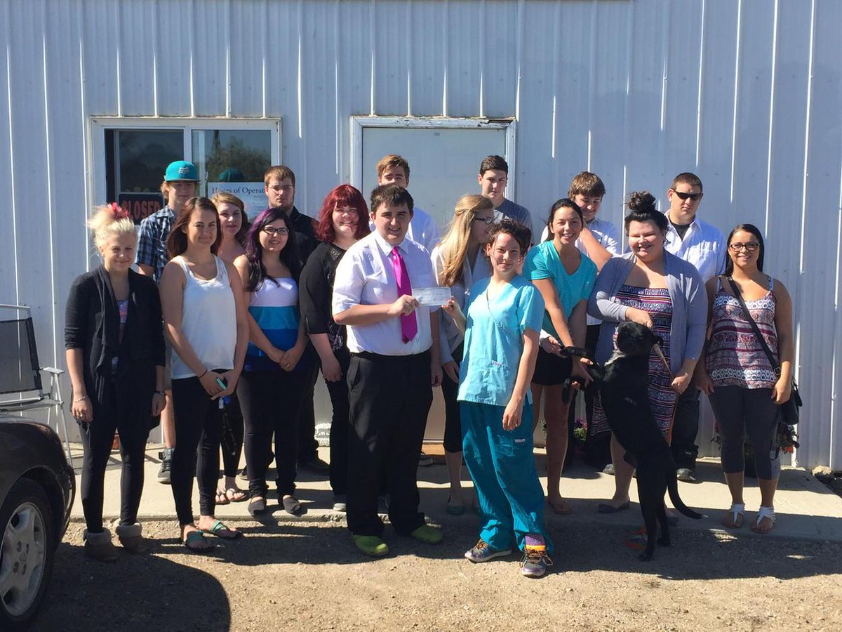 ECSBusinessEd's tweet photo. #entre30 giving the Humane Society their cheque for 1800.00. #proudteach #sociallyresponsible http://t.co/rt1vF98PWx