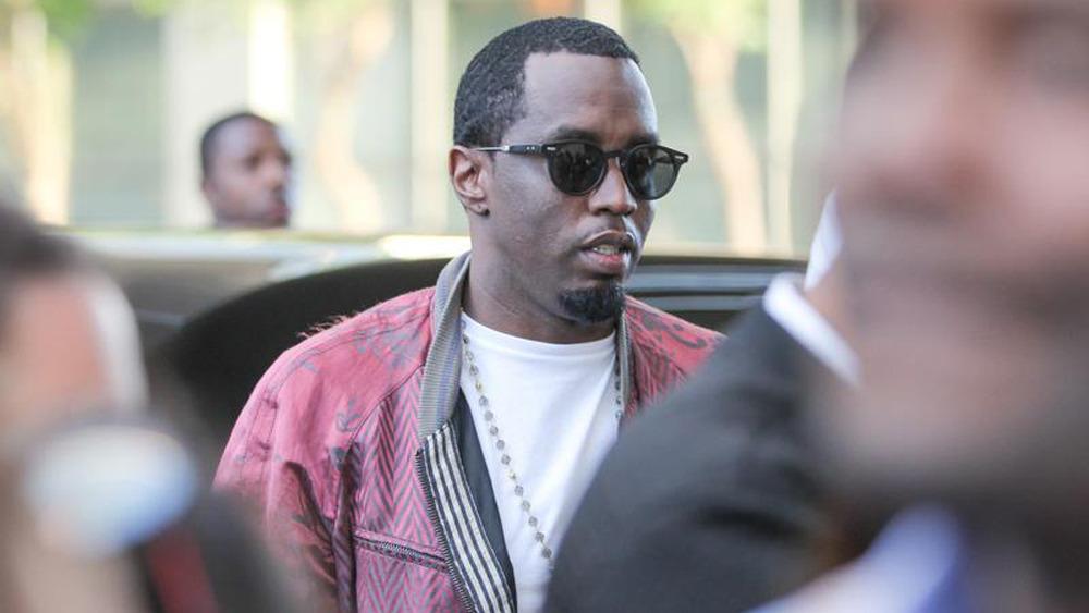 NBCSports's tweet photo. Report: Hip-hop mogul Diddy arrested for alleged attack of UCLA football coach with kettlebell http://t.co/rZ5sOgQW28 http://t.co/AuP70ScR4L
