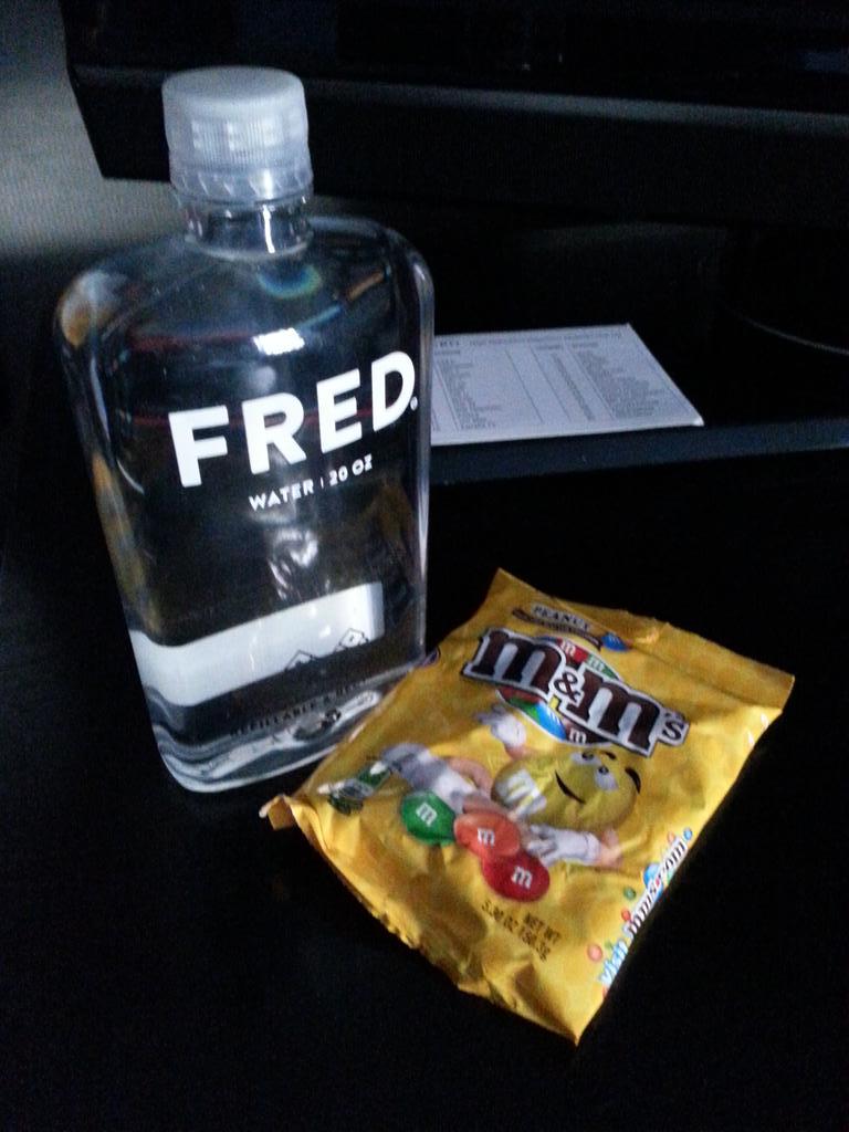 adamclevenger's tweet photo. I love staying at @KimptonCHI #Allegro! Water and M&Ms to get me through the day. #kimptonkarma #raidthebar http://t.co/JfyxGmWJUo