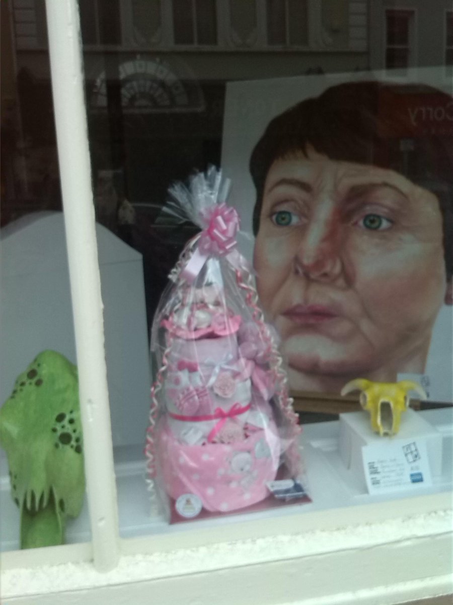 KatesTreasures's tweet photo. #newryhour one of my Nappy Cakes is taking part in the #festivalofwindows on Hill St :) exciting! bad photo, sorry http://t.co/d5lBDjw8N4