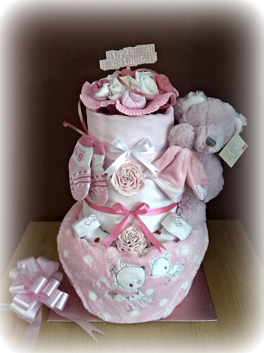KatesTreasures's tweet photo. #newryhour one of my Nappy Cakes is taking part in the #festivalofwindows on Hill St :) exciting! bad photo, sorry http://t.co/d5lBDjw8N4