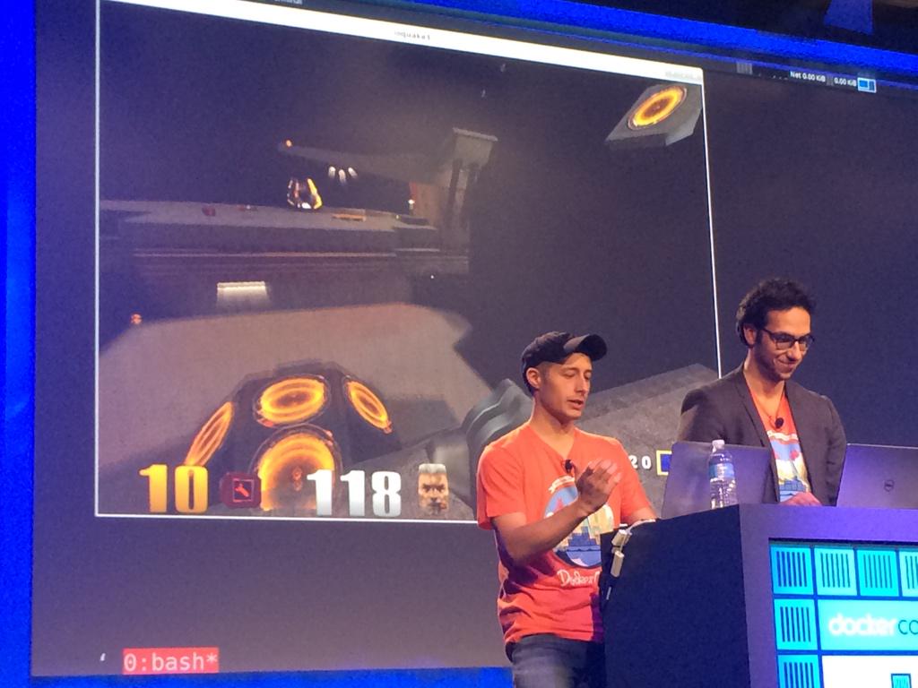 bridgetkromhout's tweet image. Quake in containers: hilariously fun #dockercon demo by @crosbymichael &amp;amp; @icecrime: migrating live containers in use.