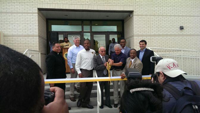 xulagold's tweet photo. #XULA opens new recreational center, Dr. Francis does the honor of cutting the ribbon. http://t.co/9G4tEByo5s