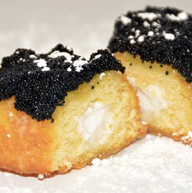 Eater's tweet image. Would you pay $125 for a Twinkie covered in caviar? eater.com/2015/6/24/8839…