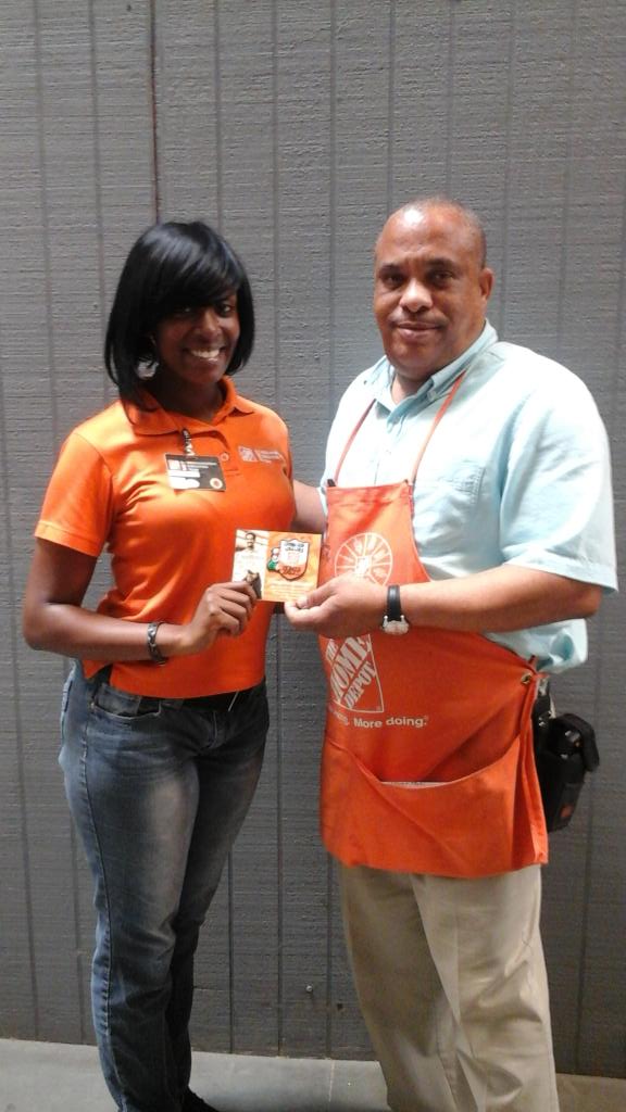 meas0880's tweet photo. Ops Mgr Geoffery McNeal giving Homer Award to DeLeon Sturdivant for outstanding customer service, store 880 http://t.co/6pxmo7LGLX