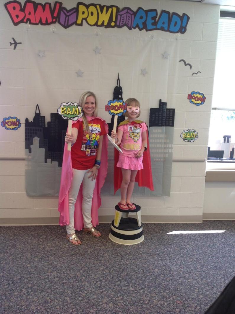 aacpl's tweet photo. Miss Rebecca poses with a young customer at the #DealeLibrary #SRC Kickoff event today!#DealeSuperReaders http://t.co/h5AwKW4buV