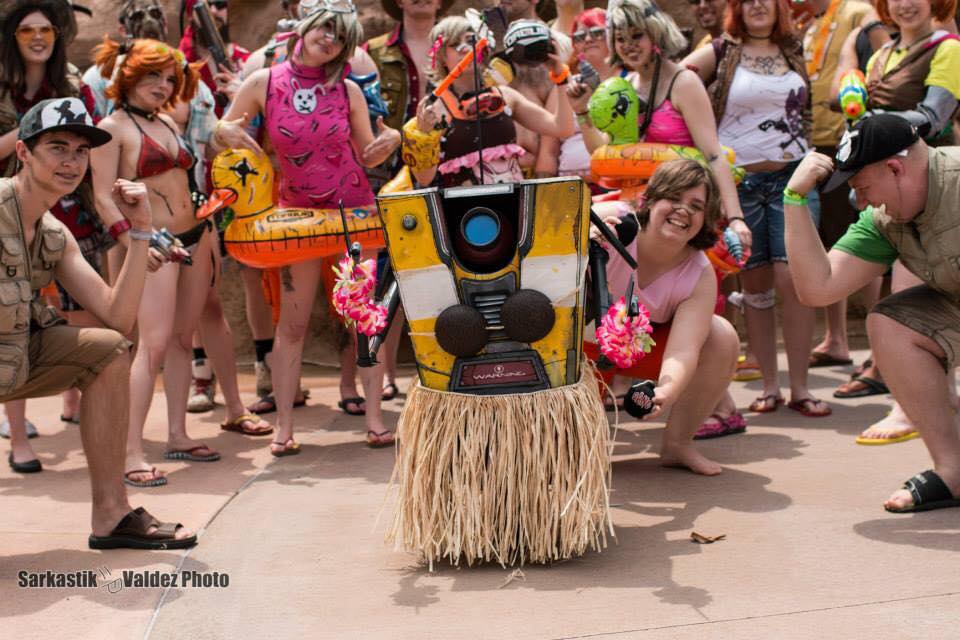 Borderlands's tweet photo. Summertime is here and the Borderlands gang is ready for some WUB in the sun! Check these #ColossalCon cosplayers! http://t.co/v3yoIIKbKl