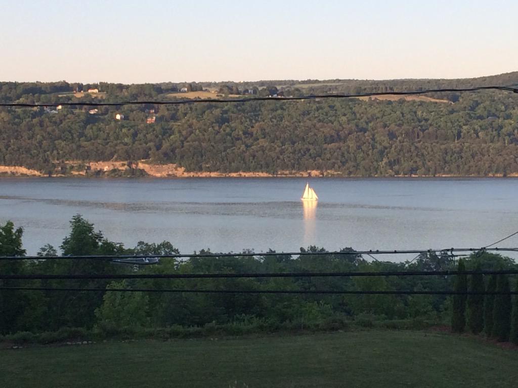 wggal's tweet photo. Seriously love my job! #Favorite week #raceweek !! And the day ends with this view #SenecaLake ๐#homearly http://t.co/3nXbMyYFHZ