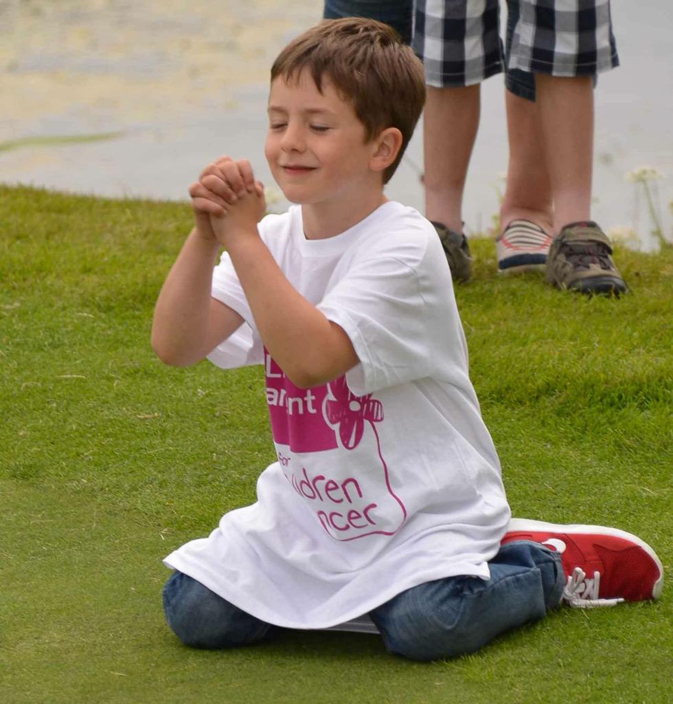 My little guy at the end of Davida'sDay 24hr golf marathon. He's obviously just having a quick chat with mummy x