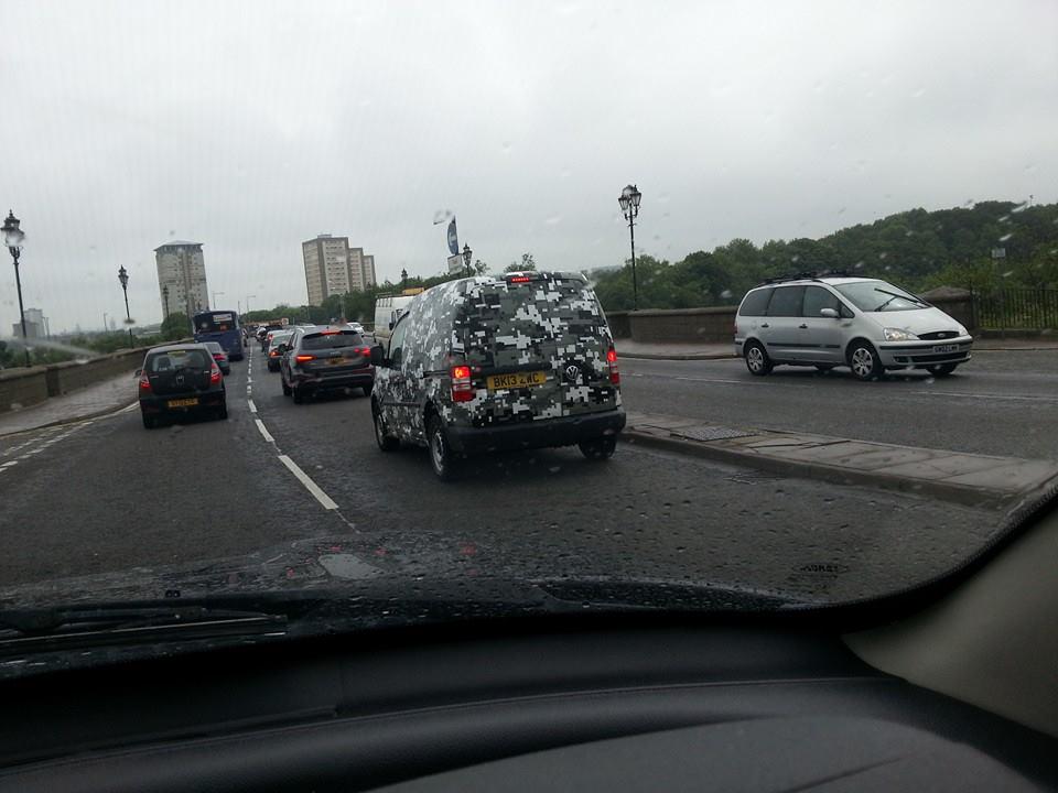 HiroRwar's tweet photo. Really spooky picture of a pair of brake lights and a licence plate floating in the middle of the road??? http://t.co/fFrkes4Tme